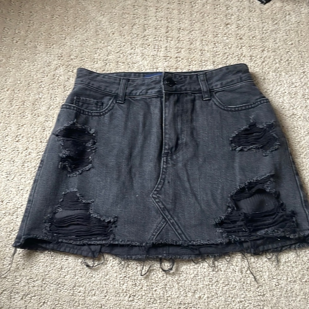 Black denim distressed mini skirt